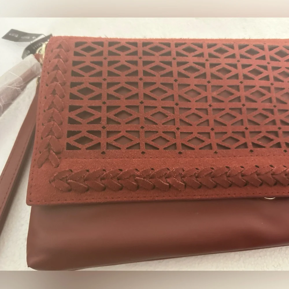 White House black market NWT rust wristlet purse lattice detail with duster bag